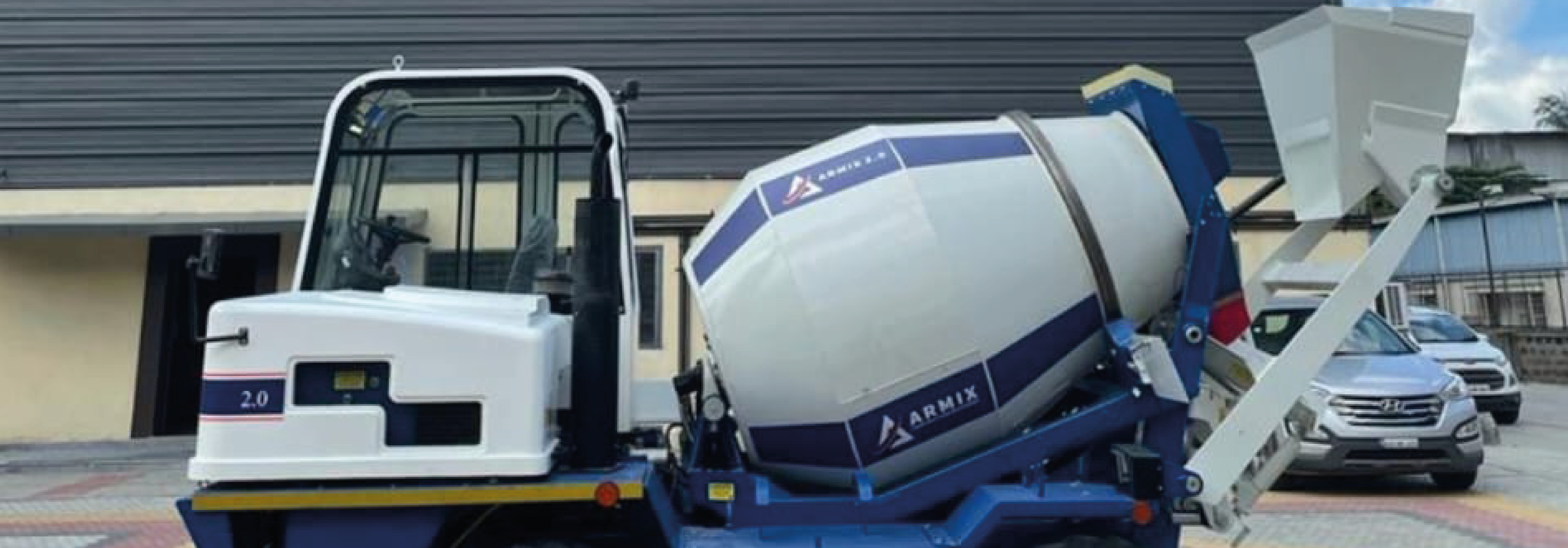 self loading concrete mixer